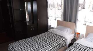 Гостевой дом Сити-Отель Курган Двухместный номер с 2 отдельными кроватями и ванной комнатой-2